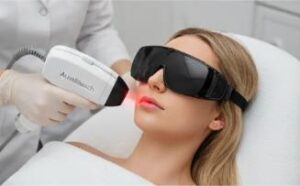 A professional dermatologist performing IPL (Intense Pulsed Light) laser treatment on a female patient’s face using an Alma Lasers handpiece in a modern aesthetic clinic. The patient wears protective black goggles for eye safety during the skin rejuvenation procedure.